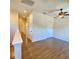 Spacious bedroom with hardwood floors and ceiling fan at 1720 Crocker Ave, Orlando, FL 32806