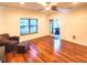 Spacious living room featuring hardwood floors and sliding doors to patio at 1720 Crocker Ave, Orlando, FL 32806