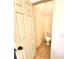 Small powder room with toilet and tile flooring at 1720 Crocker Ave, Orlando, FL 32806