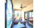 Relaxing screened patio with seating and access to backyard at 1720 Crocker Ave, Orlando, FL 32806