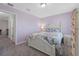 Bedroom with a double bed and light purple walls at 2197 Loblolly Bay St, Clermont, FL 34711