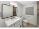 Clean bathroom with white vanity and modern fixtures at 2410 Sanford Ave, Sanford, FL 32771