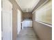 Laundry room with washer, dryer, and storage at 2410 Sanford Ave, Sanford, FL 32771