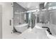 Modern bathroom with double vanity, soaking tub, and shower at 2661 Via Tuscany, Winter Park, FL 32789