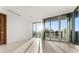 Spacious bedroom with floor-to-ceiling windows and sunlight at 2661 Via Tuscany, Winter Park, FL 32789
