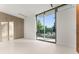 Bright bedroom with sliding glass doors leading to a private deck at 2661 Via Tuscany, Winter Park, FL 32789