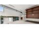 Open concept hallway showcasing sleek built-in storage at 2661 Via Tuscany, Winter Park, FL 32789