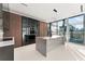 Contemporary kitchen featuring a large island and stainless steel appliances at 2661 Via Tuscany, Winter Park, FL 32789