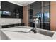 Modern kitchen with a sleek island and stainless steel sink at 2661 Via Tuscany, Winter Park, FL 32789