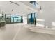 Open living area with high ceilings and large windows at 2661 Via Tuscany, Winter Park, FL 32789