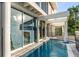 Modern rectangular pool with spa and safety fence at 2661 Via Tuscany, Winter Park, FL 32789