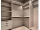 Large walk-in closet with custom built-ins and LED lighting at 2661 Via Tuscany, Winter Park, FL 32789
