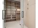 Spacious walk-in closet with ample shelving and drawer space at 2661 Via Tuscany, Winter Park, FL 32789