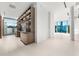 Modern wet bar with sleek cabinetry and a granite countertop at 2661 Via Tuscany, Winter Park, FL 32789