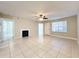 Spacious living room featuring tile floors and a ceiling fan at 375 Lake Ontario Ct # 102, Altamonte Springs, FL 32701