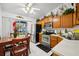 Well-equipped kitchen with wood cabinets and stainless steel appliances at 5417 Lake Margaret Dr # G, Orlando, FL 32812