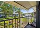 Screened porch overlooking a green backyard at 5417 Lake Margaret Dr # G, Orlando, FL 32812