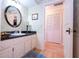 Bathroom with sink, vanity, and access to other rooms at 618 Gran Paseo Dr, Orlando, FL 32825