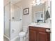 Clean bathroom, featuring a toilet, shower, and vanity at 7282 Backwoods Trl, Windermere, FL 34786