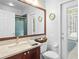 Bathroom with large mirror and granite vanity at 100 Michael Dr, Oviedo, FL 32765