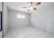 Spacious bedroom with tile flooring and ceiling fan at 1044 Mosshart Ln, Orlando, FL 32825