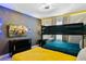 Minions themed bedroom with bunk beds and TV at 1146 Kingsbarn St, Davenport, FL 33896