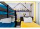 Minions themed bedroom with bunk beds and mural at 1146 Kingsbarn St, Davenport, FL 33896