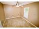 Well-lit bedroom with tile floors and ceiling fan at 1326 Dunbarton Ct, Kissimmee, FL 34758