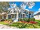 Two-story house with a charming front yard and walkway at 14643 Tanja King Blvd, Orlando, FL 32828