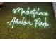 Neon sign for Marketplace at Avalon Park at 14643 Tanja King Blvd, Orlando, FL 32828