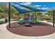 playground with colorful equipment under shaded areas at 14643 Tanja King Blvd, Orlando, FL 32828