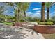Landscaped Town Park with brick pathways and palm trees at 14643 Tanja King Blvd, Orlando, FL 32828