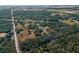 Aerial view of a rectangular lot in a wooded, rural area at 17144 Phil C Peters Rd, Winter Garden, FL 34787