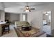 Living room with stone fireplace and sofa at 2010 Overlook Dr, Winter Haven, FL 33884