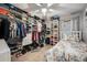 Bedroom with a twin-size bed, large closet, and window at 2338 Darlin Cir, Orlando, FL 32820