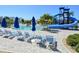 Community pool with lounge chairs and waterslide at 2338 Darlin Cir, Orlando, FL 32820