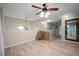 Upstairs hallway with light flooring and large mirror at 2338 Darlin Cir, Orlando, FL 32820