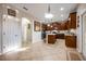 Kitchen with wooden cabinets, granite countertop and island at 2338 Darlin Cir, Orlando, FL 32820