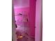 Small bedroom with bunk beds and pink walls at 3481 Cornell Ter, Deltona, FL 32738