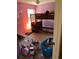 Small bedroom with bunk beds and purple walls at 3481 Cornell Ter, Deltona, FL 32738