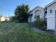 House with overgrown yard and detached shed at 3481 Cornell Ter, Deltona, FL 32738