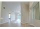 Bright living room with light flooring and high ceilings at 3772 Ventura Cove Dr, Orlando, FL 32822