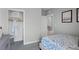 Bedroom with a closet, bed, and beach-themed decor at 427 Taylor Groves Dr, Lake Wales, FL 33853