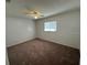 Spacious bedroom with neutral carpeting at 4518 Watch Hill Rd, Orlando, FL 32808