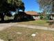 Single-story home with a well-maintained lawn at 4518 Watch Hill Rd, Orlando, FL 32808