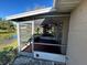 Enjoy the view from this screened porch overlooking a lake at 4518 Watch Hill Rd, Orlando, FL 32808