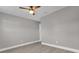 Simple bedroom with wood-look floors and ceiling fan at 616 Ellsworth St, Altamonte Springs, FL 32701