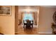 View of a formal dining room from the hallway at 6850 Spring Rain Dr, Orlando, FL 32819