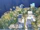 Aerial view of waterfront property with multiple buildings at 1043 Lemon Bluff Rd, Osteen, FL 32764