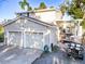 Two-car garage with covered carport and additional storage space at 1043 Lemon Bluff Rd, Osteen, FL 32764